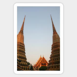 Part view from two stupa against clear sky at Wat Pho Buddha temple. Sticker